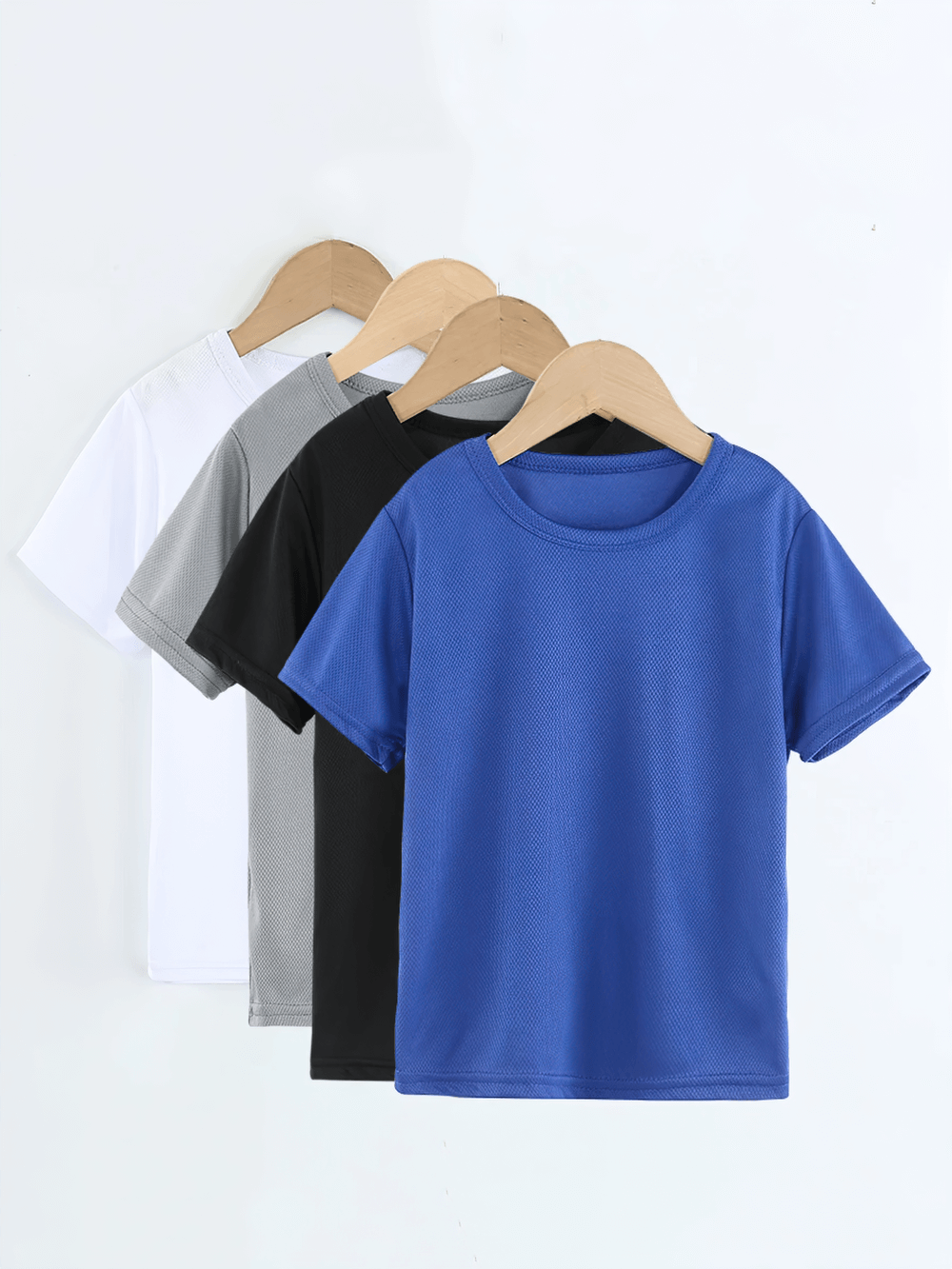 Round Neck Mesh T-Shirts in bright colors on hangers, perfect for sports or casual wear, showcasing breathable fabric and durable stitching.